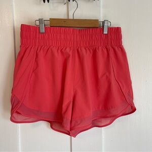 Athleta Women’s High Rise Mesh Racer Run 3” Shorts. Size Medium. Pink